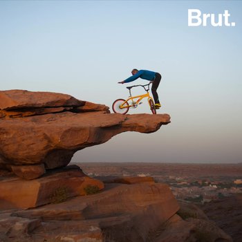 71-Year-Old Does Yoga On A Bike On Clifftops